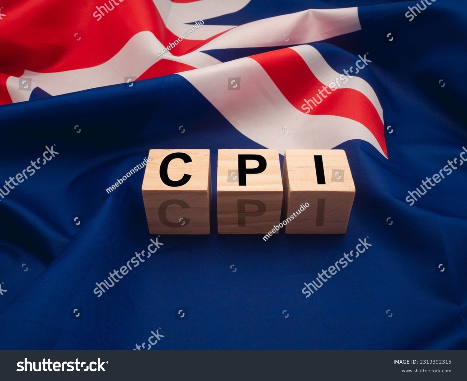 Consumer Price Index concept. Wooden cubes with the letters CPI on the Australia flag background. #2319392315