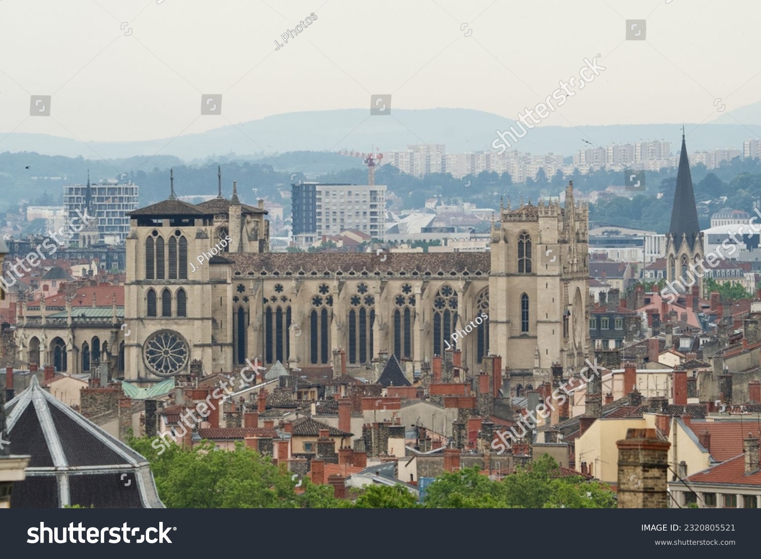 Side view of the famous Lyon Cathedral ( Saint Jean-Baptiste cathedral) with the 
Saint george church behind in Rhone Alpes, France. #2320805521