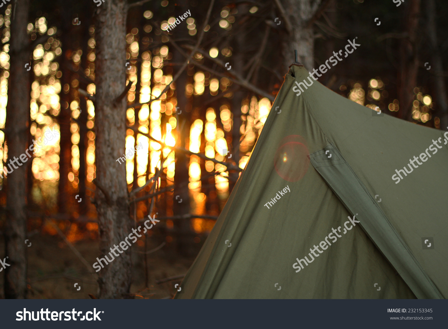 Camping tent in the forrest with sunset #232153345
