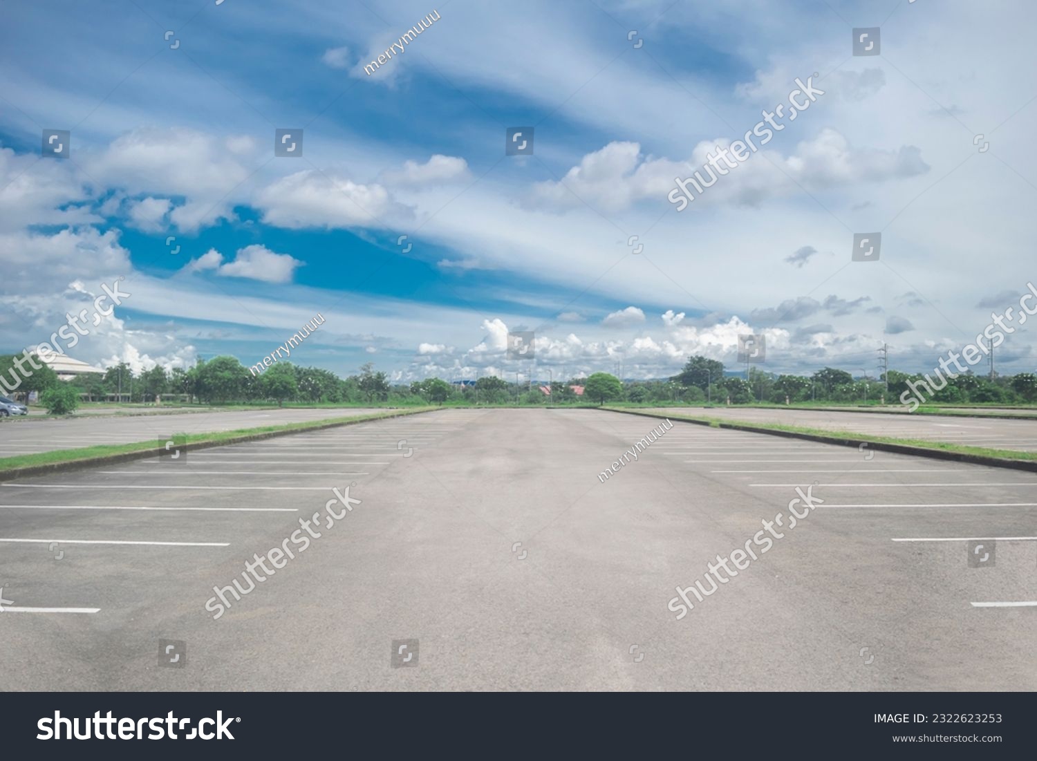 Wide empty asphalt parking lot background. with many cars parked background. outdoor empty space parking lot with trees and cloudy sky. outside parking lot in a park
 #2322623253