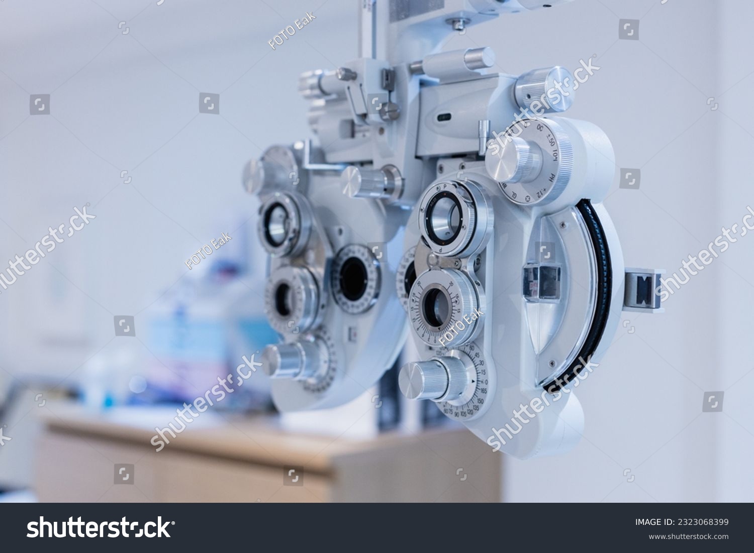 Phoropter eyesight measurement testing machine, Eye health check and ophthalmology concept. Web banner size. Copy space. #2323068399