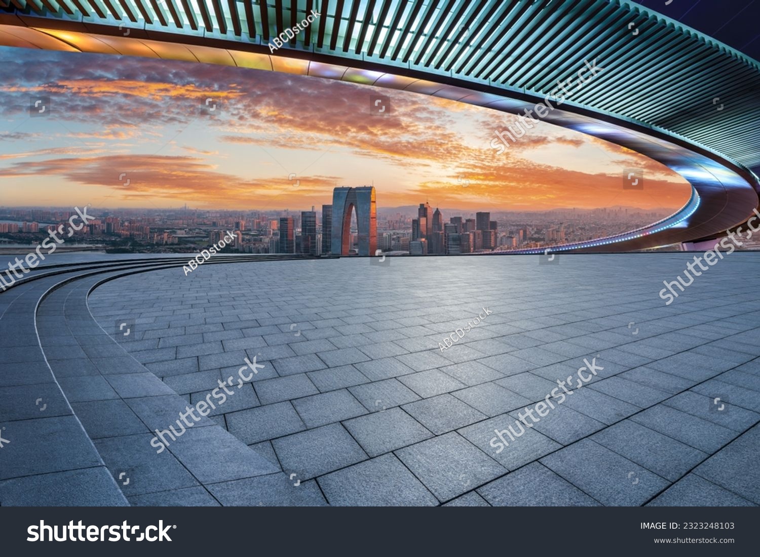 Empty square floors and city skyline with modern buildings at sunset in Suzhou, Jiangsu Province, China. high angle view. #2323248103