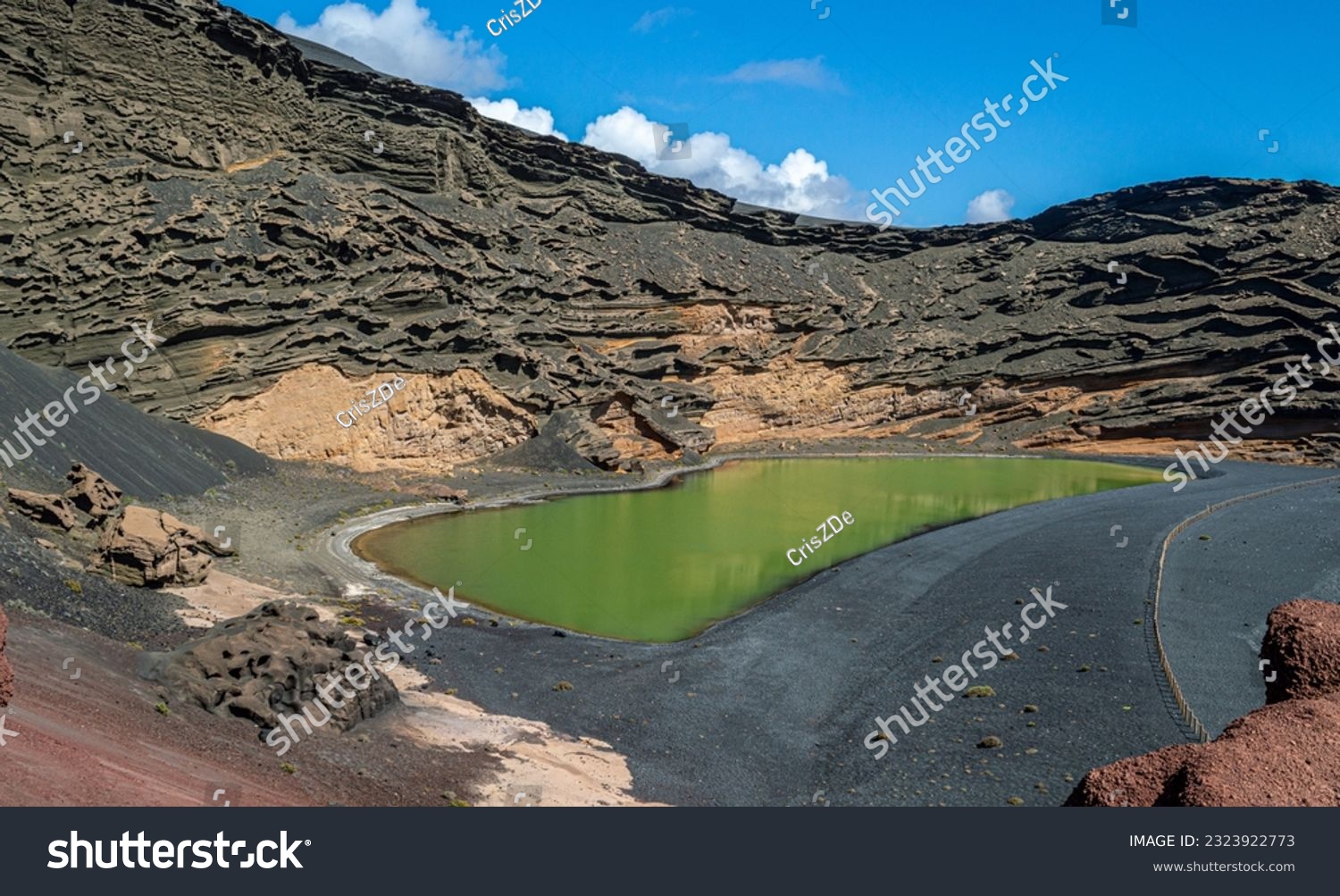 Green Lagoon or Charco de los Clicos. The green coloration is due to sulfur and algae. It is the crater of a volcano that has been invaded by the ocean. Also formed by a black sand beach. #2323922773