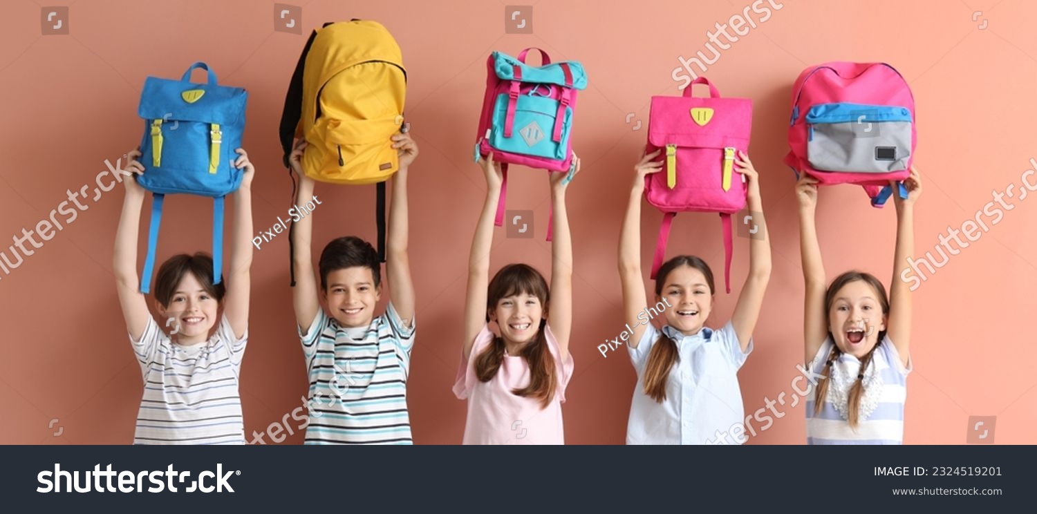 Many little students with schoolbags on beige background #2324519201