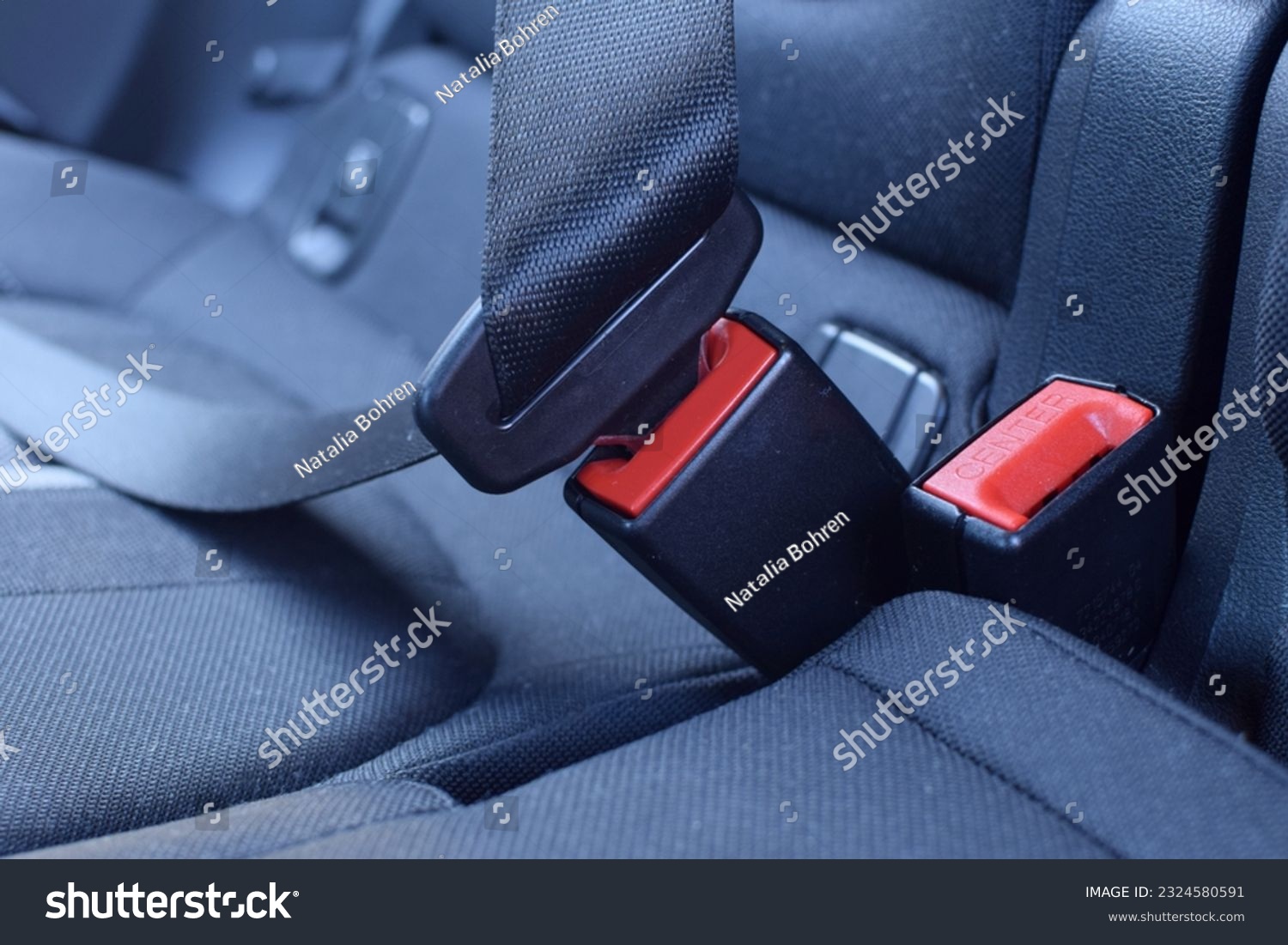 Seat belt in the back seat of the car. #2324580591