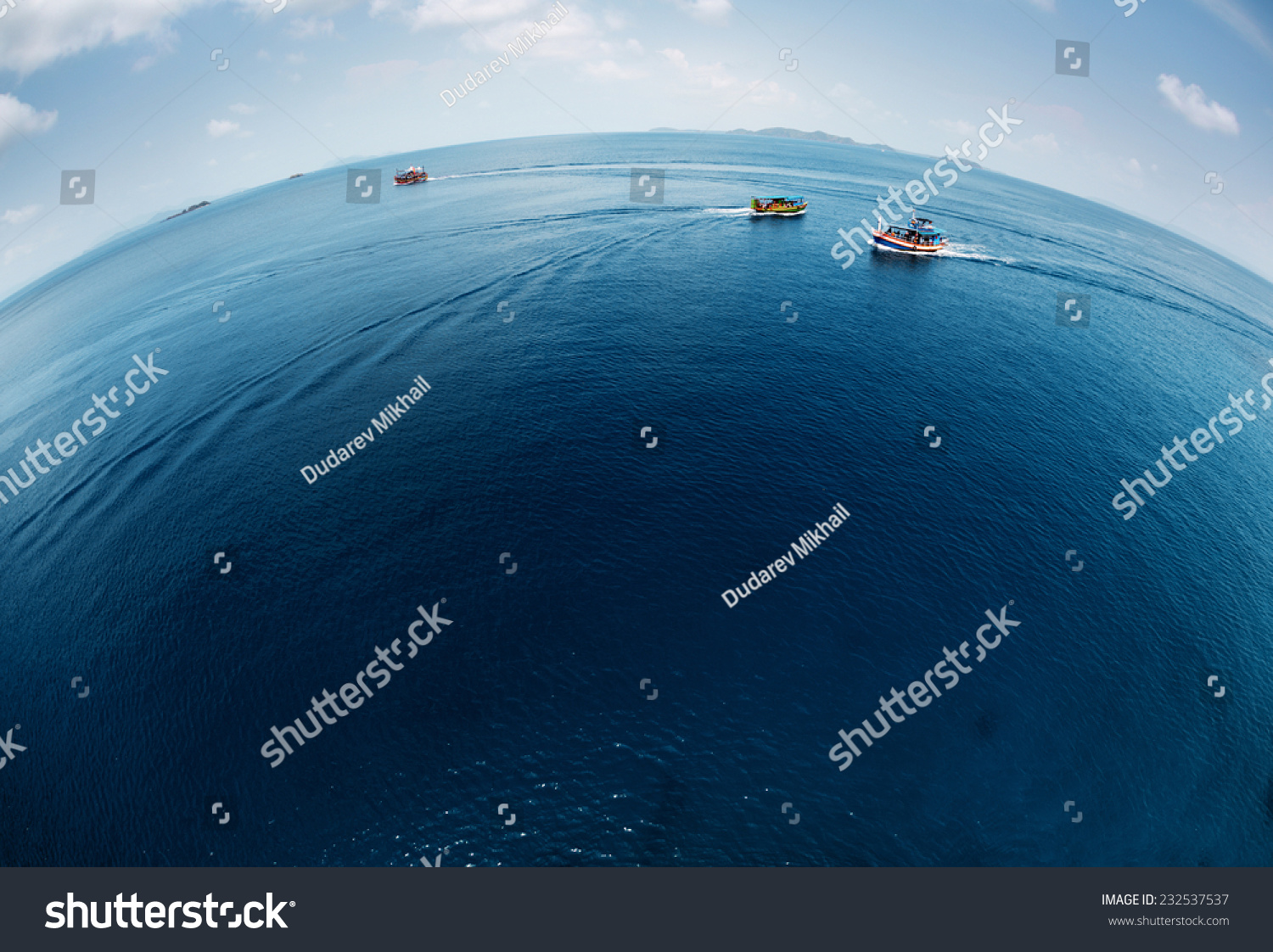 Aerial view of the calm tropical sea with ships on surface #232537537