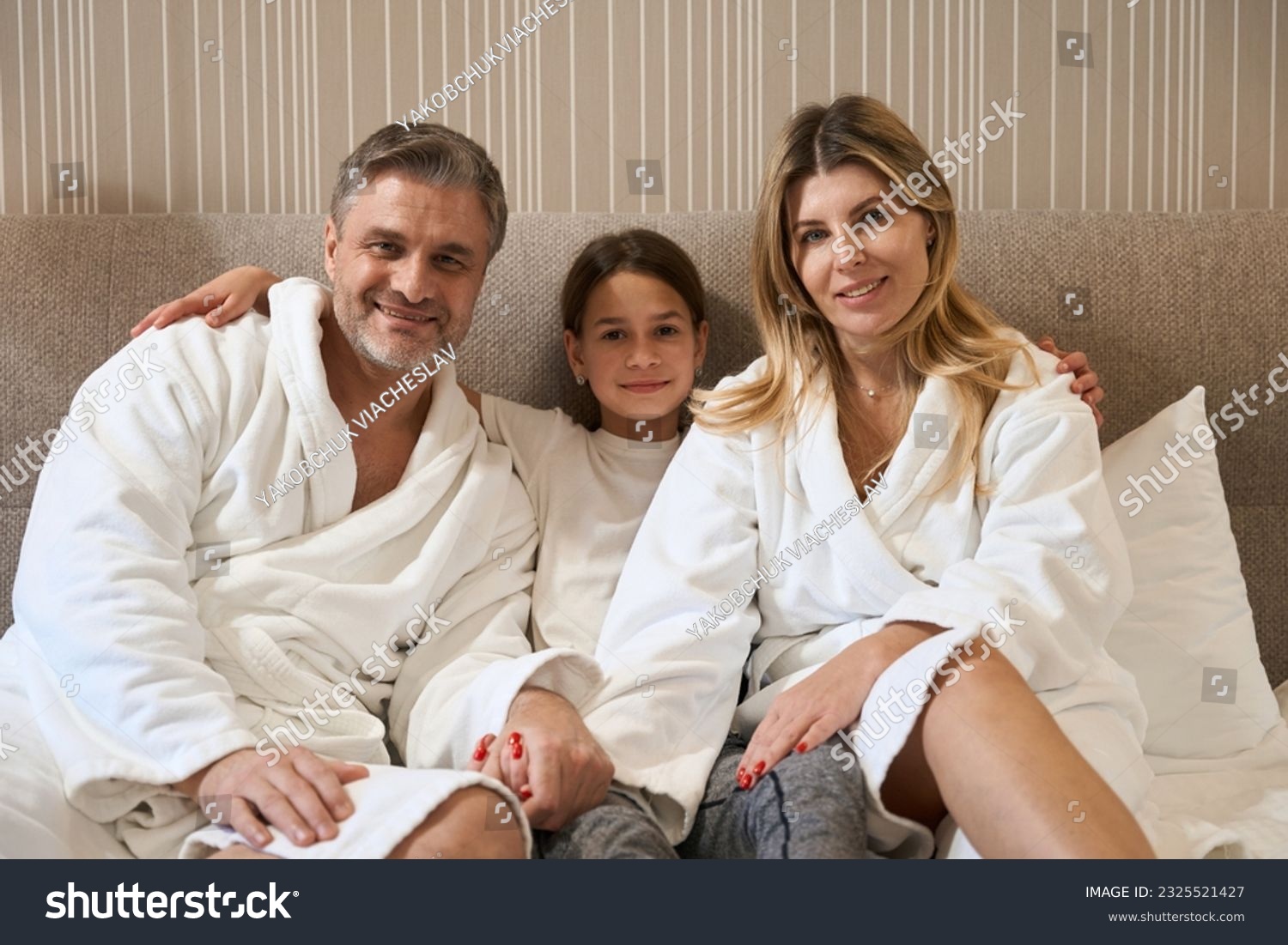 Family spending time together in the motel #2325521427