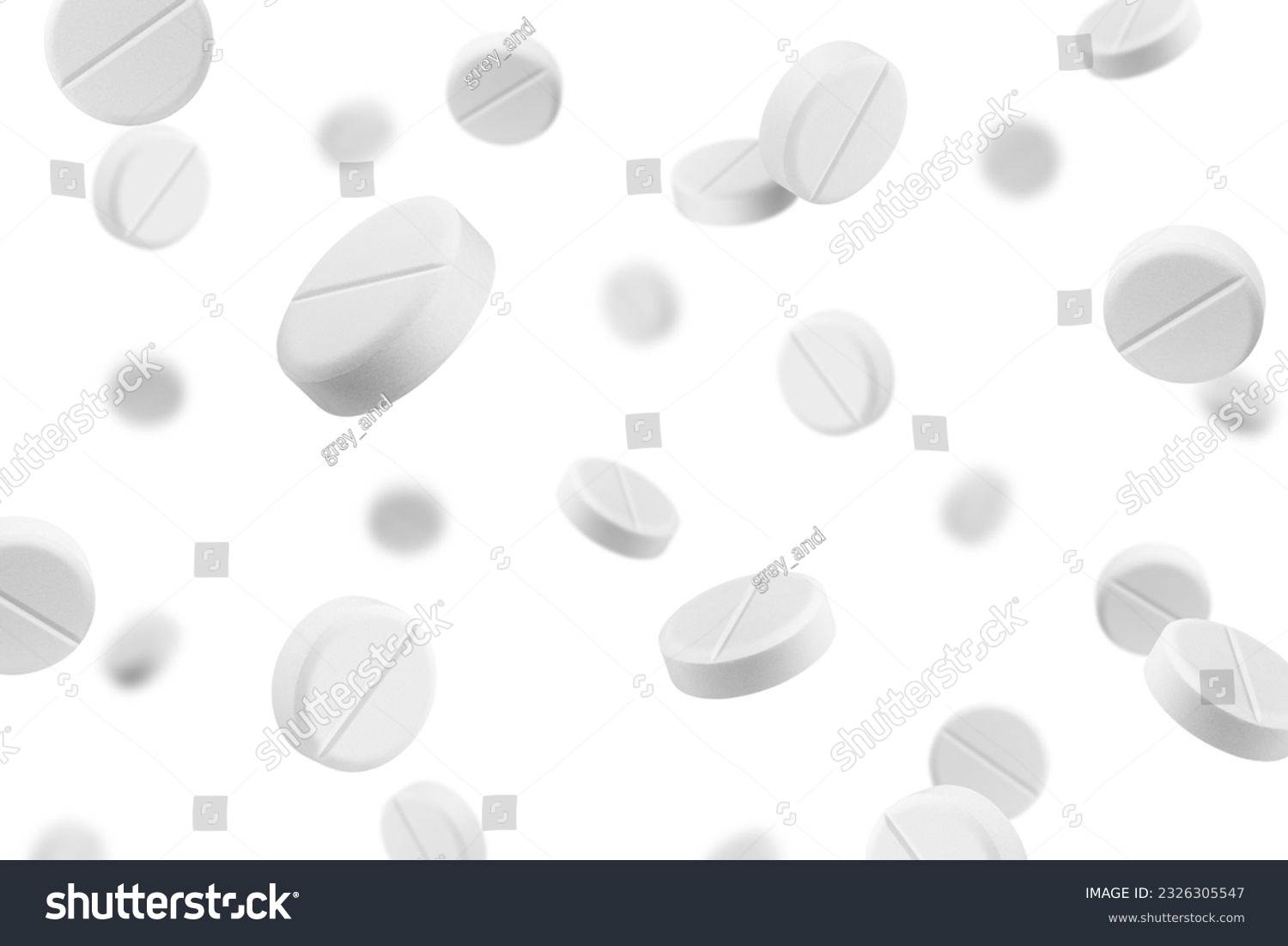 Falling Pills isolated on white background, selective focus #2326305547