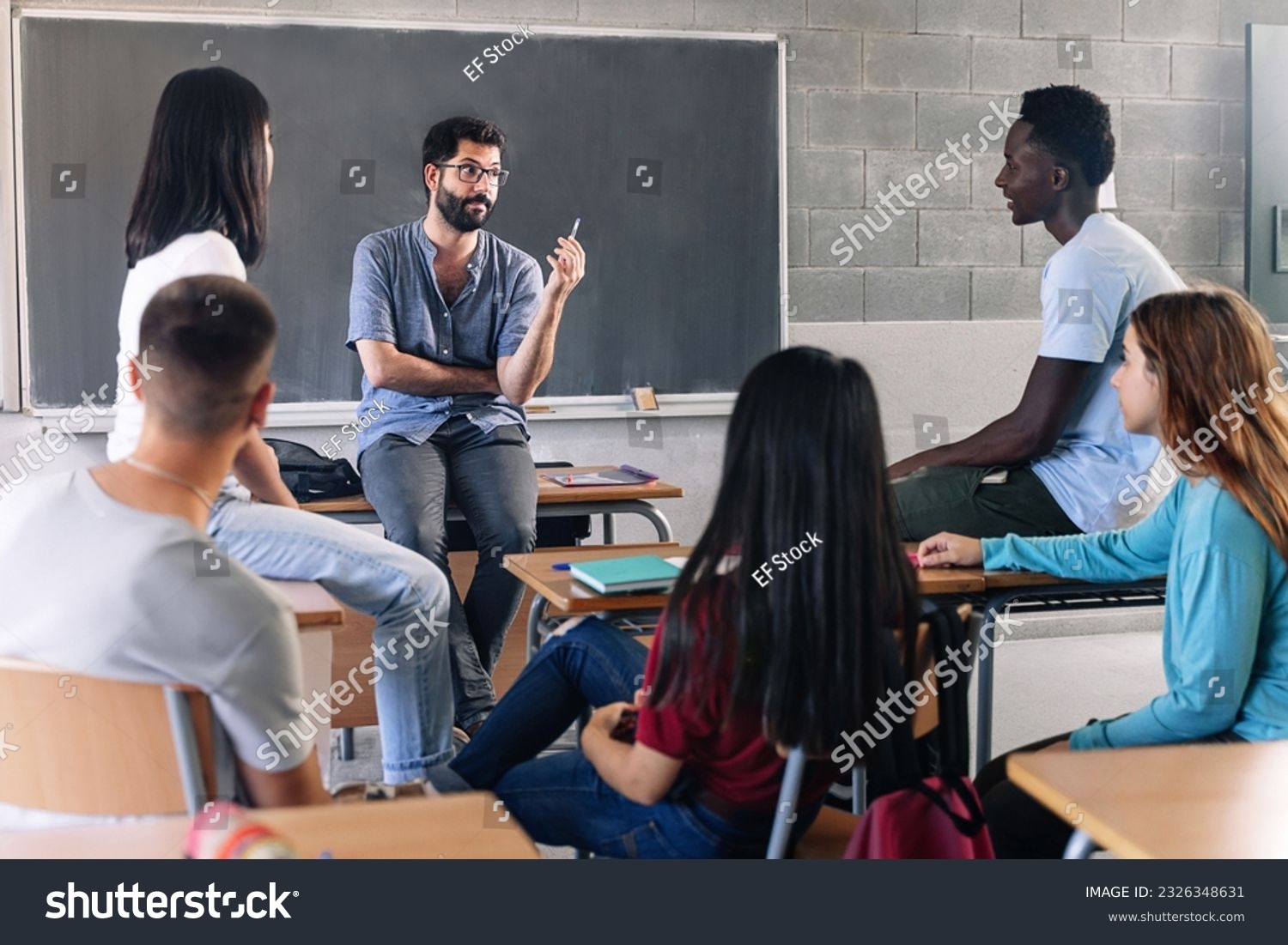 Teenager student class and young teacher sharing group discussion at High School - Education MentalHealth Support #2326348631