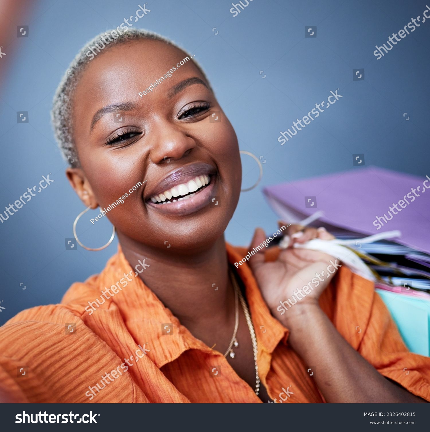 Selfie, smile and portrait of a woman with shopping bags in studio after sale, promotion or discount. Happy, excited and African female person taking picture after buying products by gray background. #2326402815