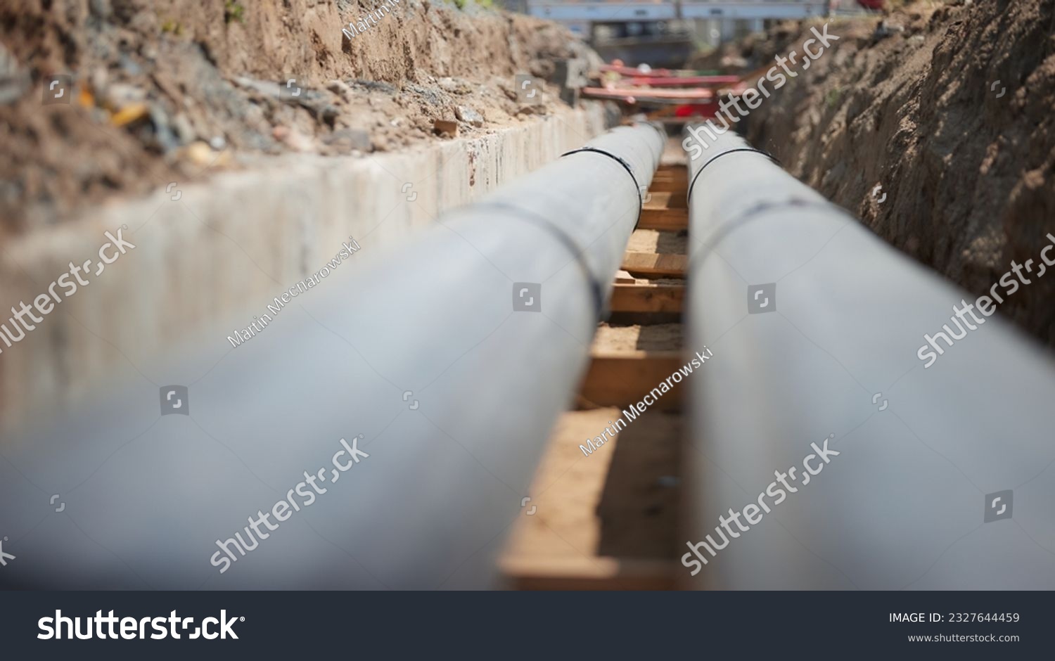 Construction and installation of the backbone pipeline of Pre-insulated hot water tubes in concrete collector.  Greening and  Efficiency of heat supply. Ongoing construction. Energy distribution. #2327644459