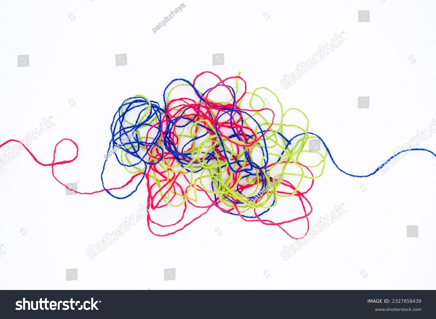 Tangled ropes on white background, three colorful ropes in confusion, psychotherapy, or difficult problem that hard to resolve #2327858439