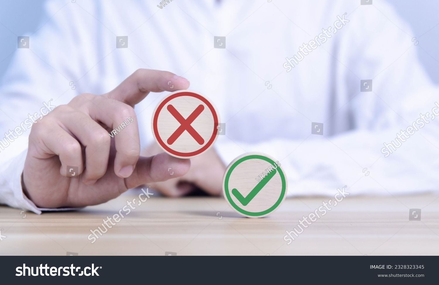 wood block showing right and wrong sign decision concept, vote and think yes or no Business options for difficult situations true and false symbol. select the wrong mark #2328323345