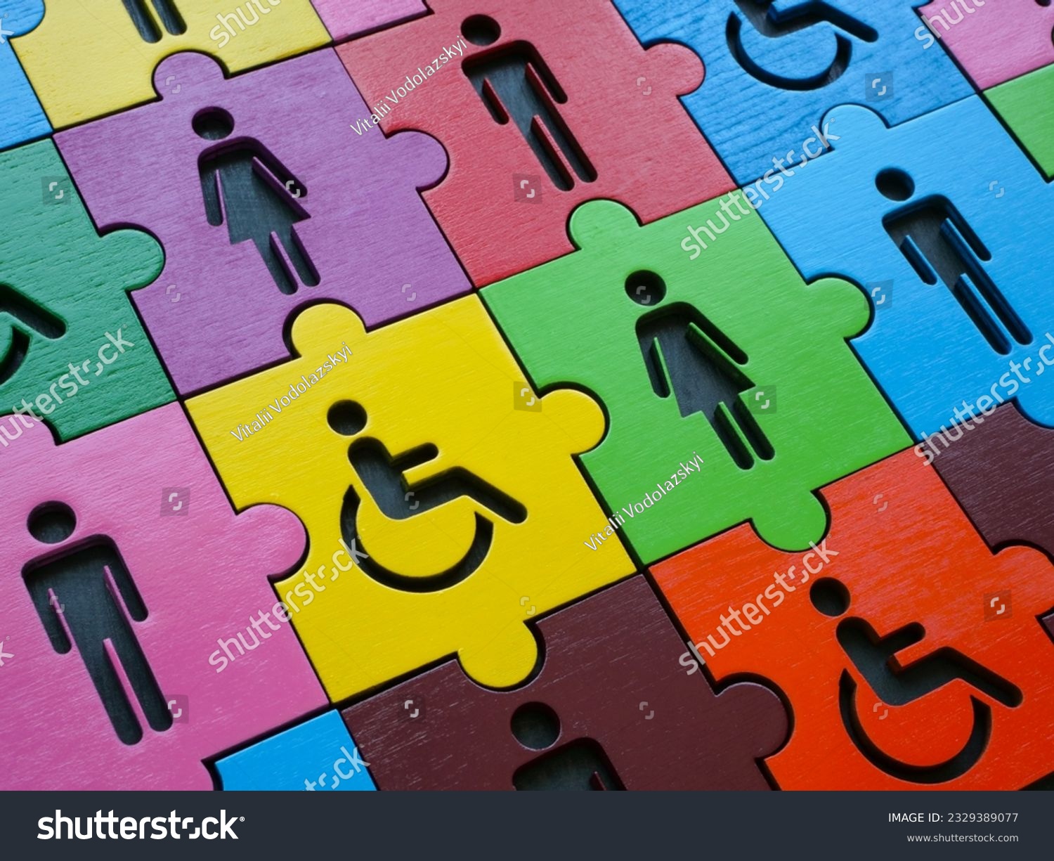 Diversity and inclusion. Multi colored puzzle with figures of people. #2329389077