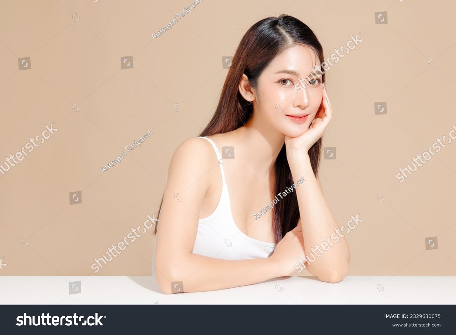 Young Asian beauty woman model long hair with korean makeup style on face and perfect skin on isolated beige background. Facial treatment, Cosmetology, Spa, Aesthetic, plastic surgery. #2329630075
