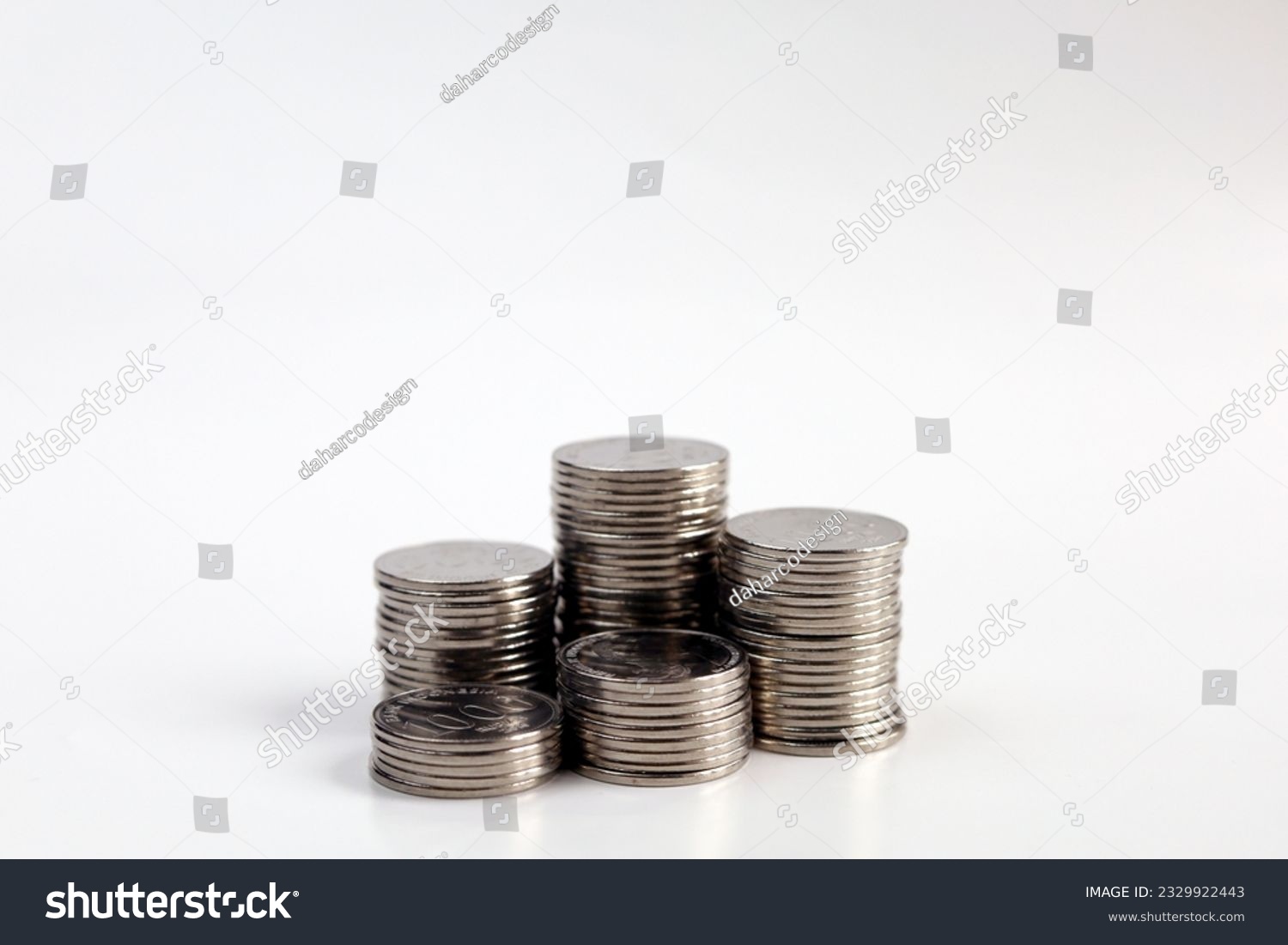 Coins stack isolated on white background. Indonesia coins currency #2329922443