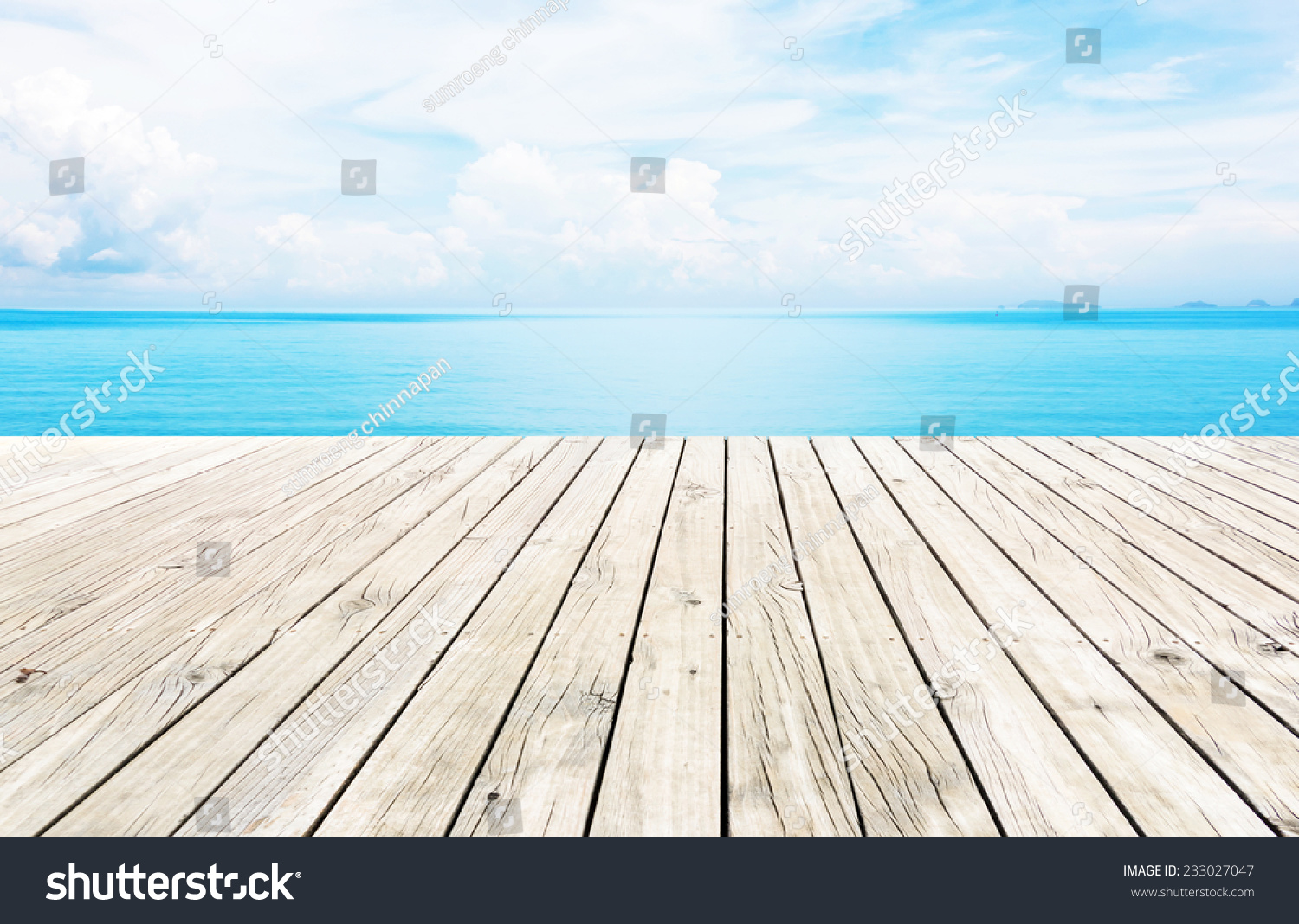 Wooden pier with blue sea and sky background  #233027047