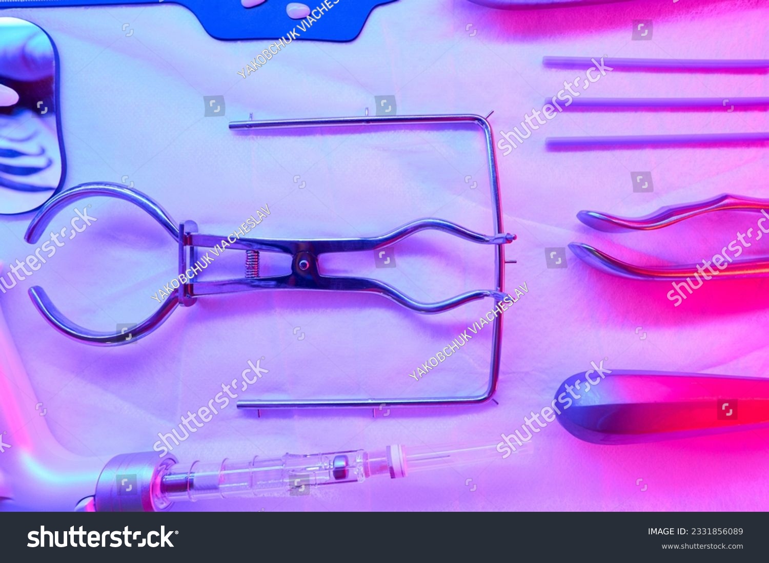 Medical instruments are sterilized under an infrared lamp #2331856089