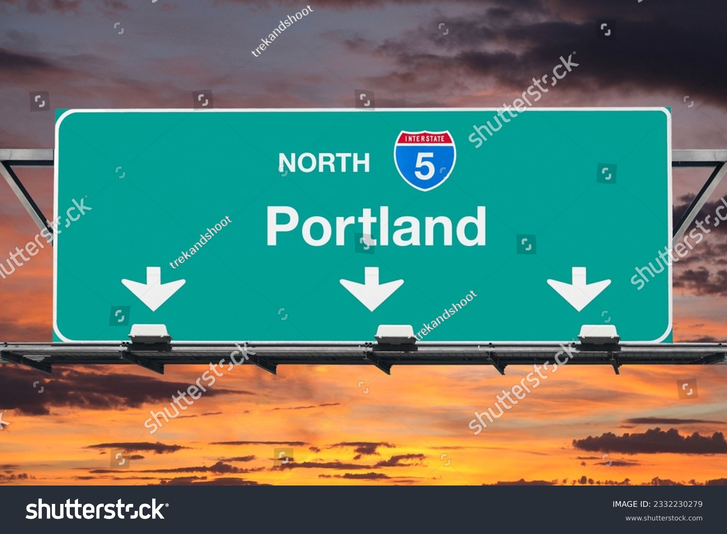 Portland Oregon route 5 north overhead freeway sign with sunset sky. #2332230279