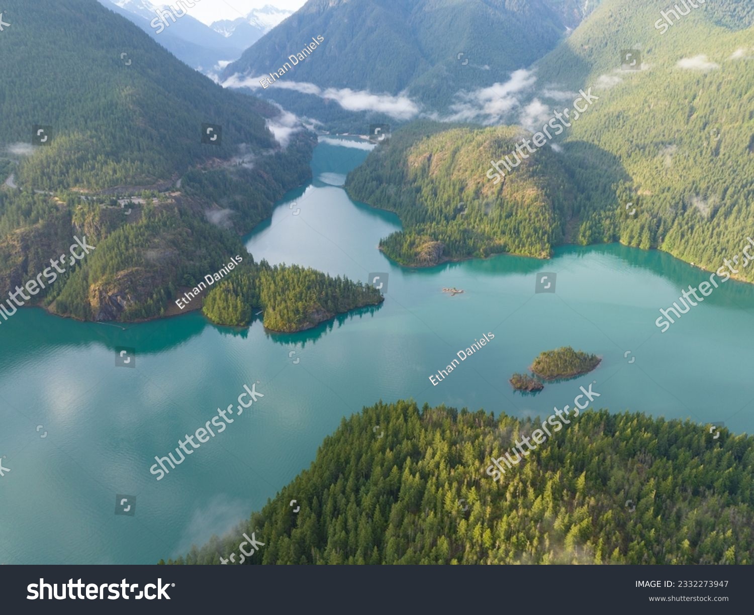Rugged, forest-covered slopes surround Diablo Lake in North Cascades National Park. This mountainous region of northern Washington is absolutely beautiful and easily accessed during summer months. #2332273947