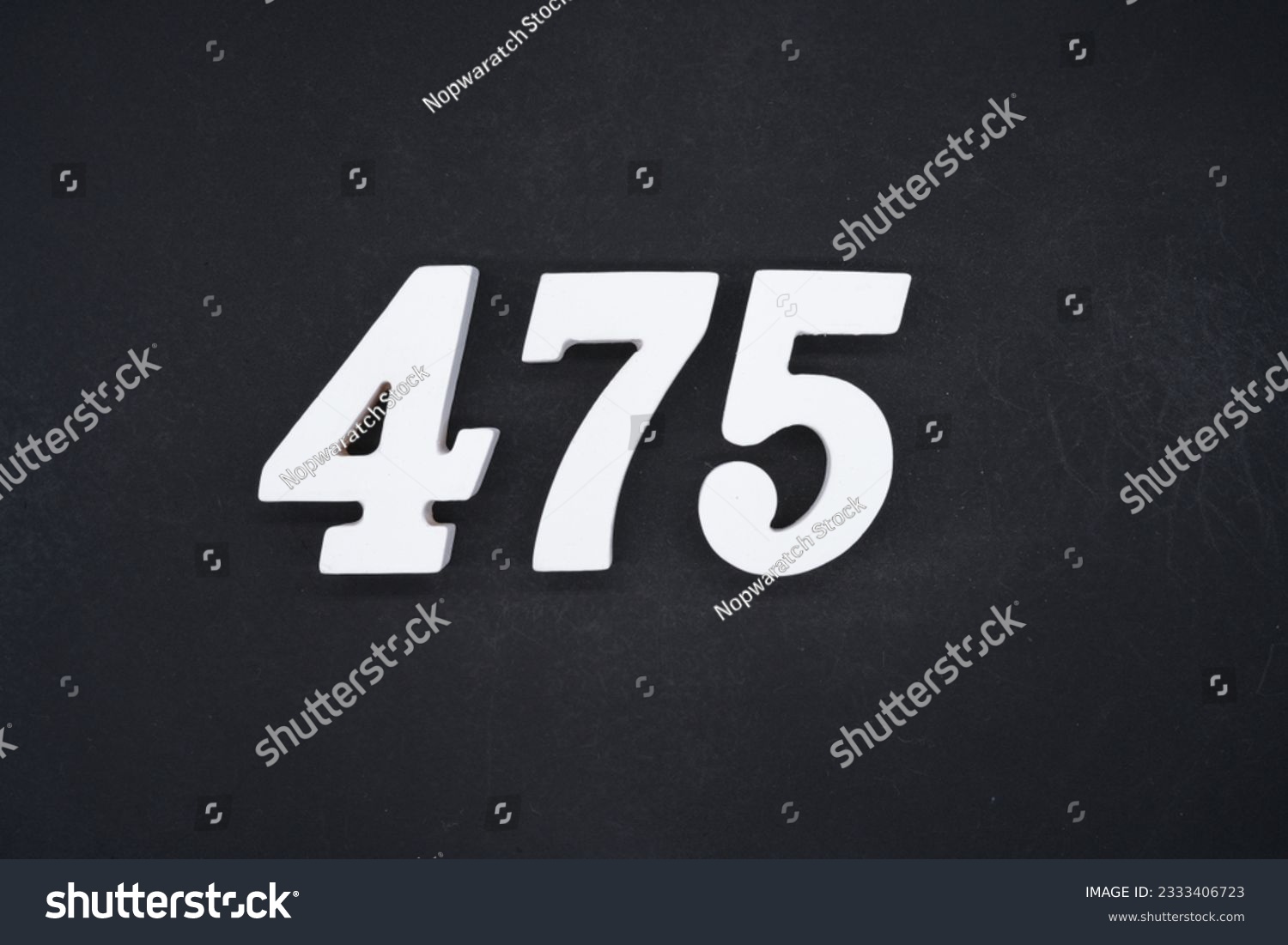Black for the background. The number 475 is made of white painted wood. #2333406723