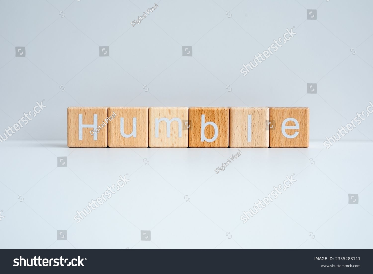 Wooden blocks form the text "Humble" against a white background. #2335288111