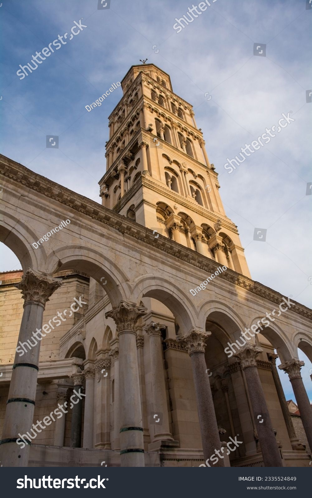 The Romanesque bell tower of the Cathedral of Saint Domnius - Katedrala Svetog Duje - in Split, Croatia. Located within the Diocletian Palace. Seen from Peristil  #2335524849