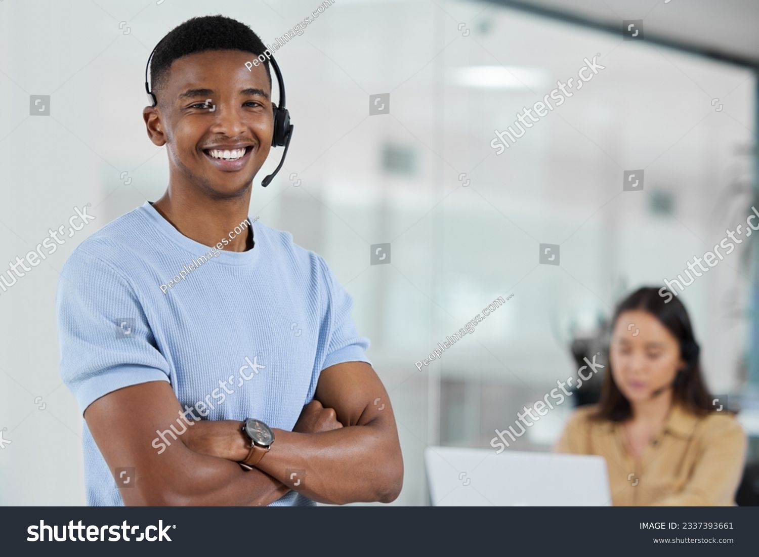 Portrait, call center and arms crossed with a black man consultant standing in his office for support. Customer service, contact us and trust with a happy male telemarketing employee in the office #2337393661
