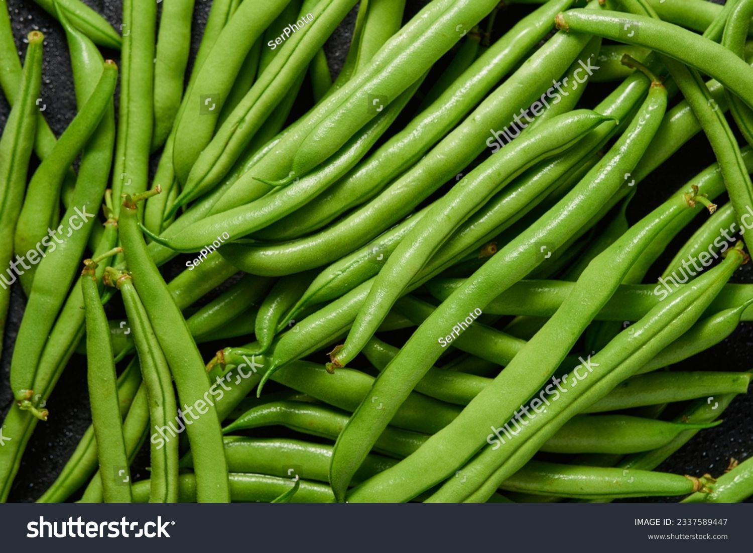Heap of green pods of raw, not cooked, asparagus beans top view. #2337589447