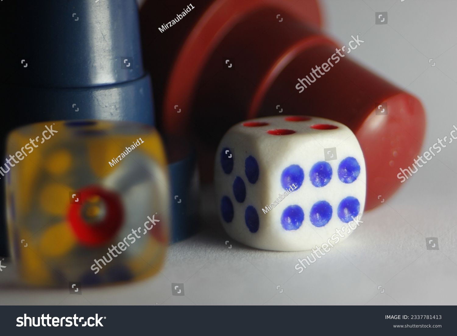 A Picture Of White And A Transparent Dice On White Background #2337781413