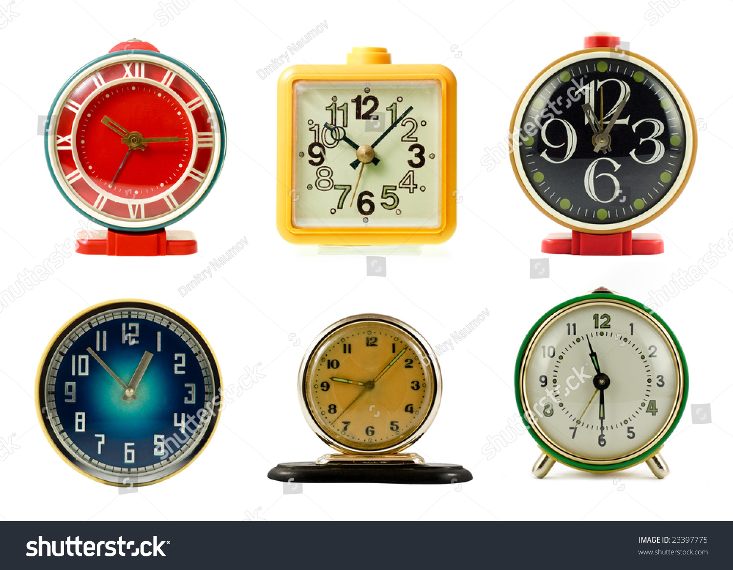 Vintage mechanical wind-up alarm clocks on white background #23397775