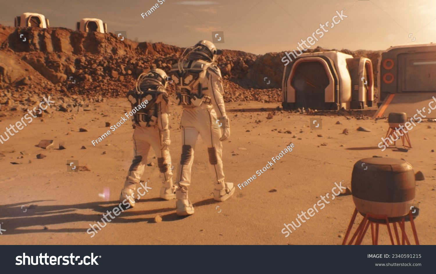 Two astronauts in spacesuits walk toward research station, colony or scientific base on Mars. AI powered rover rides in the background. Space mission. Futuristic colonization and exploration concept. #2340591215
