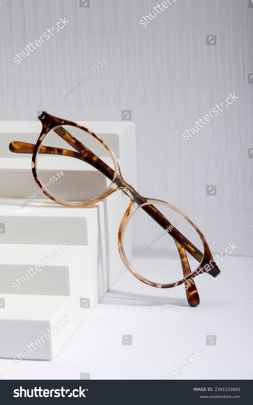 Sunglasses and glasses sale concept. Trendy sunglasses background. Trendy Fashion summer accessories. Copy space for text. Summer sale. Optic store discount poster. glasses with rounded frames. #2341133883
