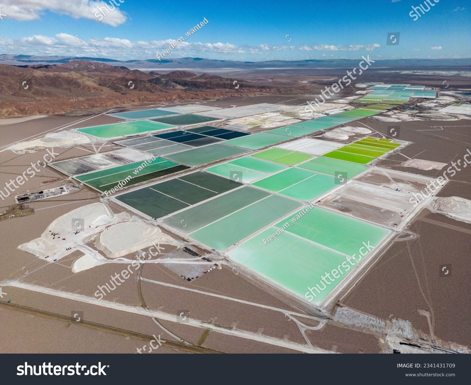 Aerial view of lithium fields in the Atacama desert in Chile, South America - a surreal landscape where batteries are born #2341431709
