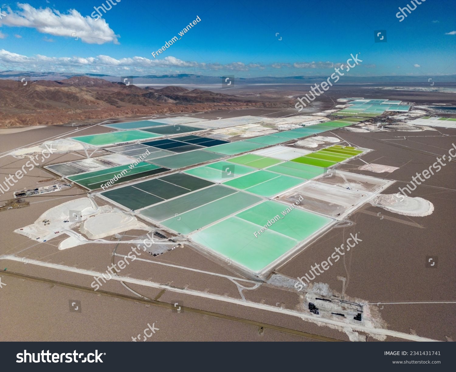 Aerial view of lithium fields in the Atacama desert in Chile, South America - a surreal landscape where batteries are born #2341431741