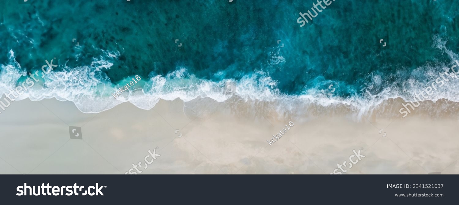 Top view aerial image from drone of an stunning beautiful sea landscape beach with turquoise water with copy space for your text. Beautiful Sand beach with turquoise water, aerial UAV drone shot #2341521037