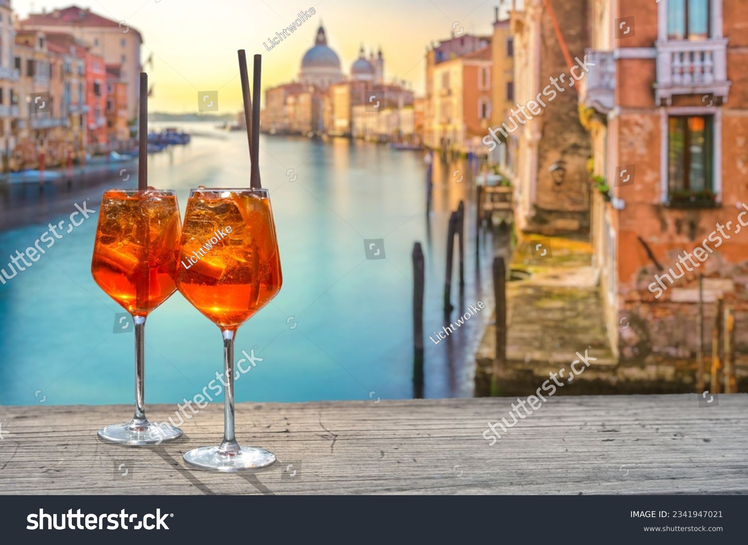 two Aperol Spritz in Venice, in the background the view from the Accademia Bridge #2341947021