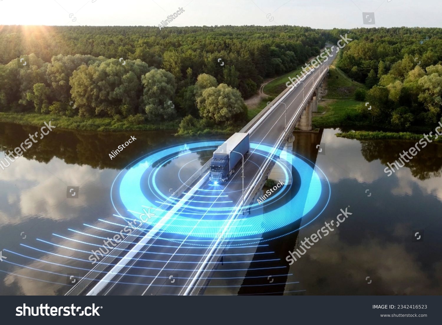 Autonomous semi-truck with a trailer, controlled by artificial intelligence, drives over a bridge over the river. Cargo delivery, transportation of the future. Artificial intelligence. Self driving.
 #2342416523