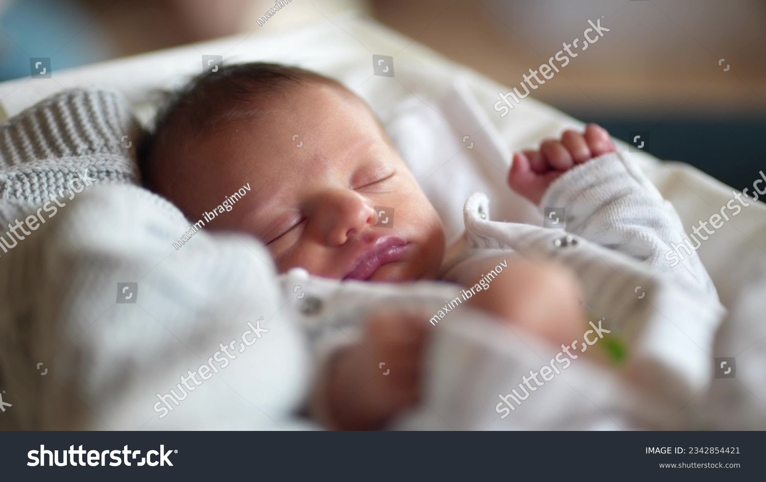 newborn baby sleep. boy infant sleep lies in child bed. happy family birthday closeup baby lifestyle concept. cute baby close up sleeping in bed at home #2342854421