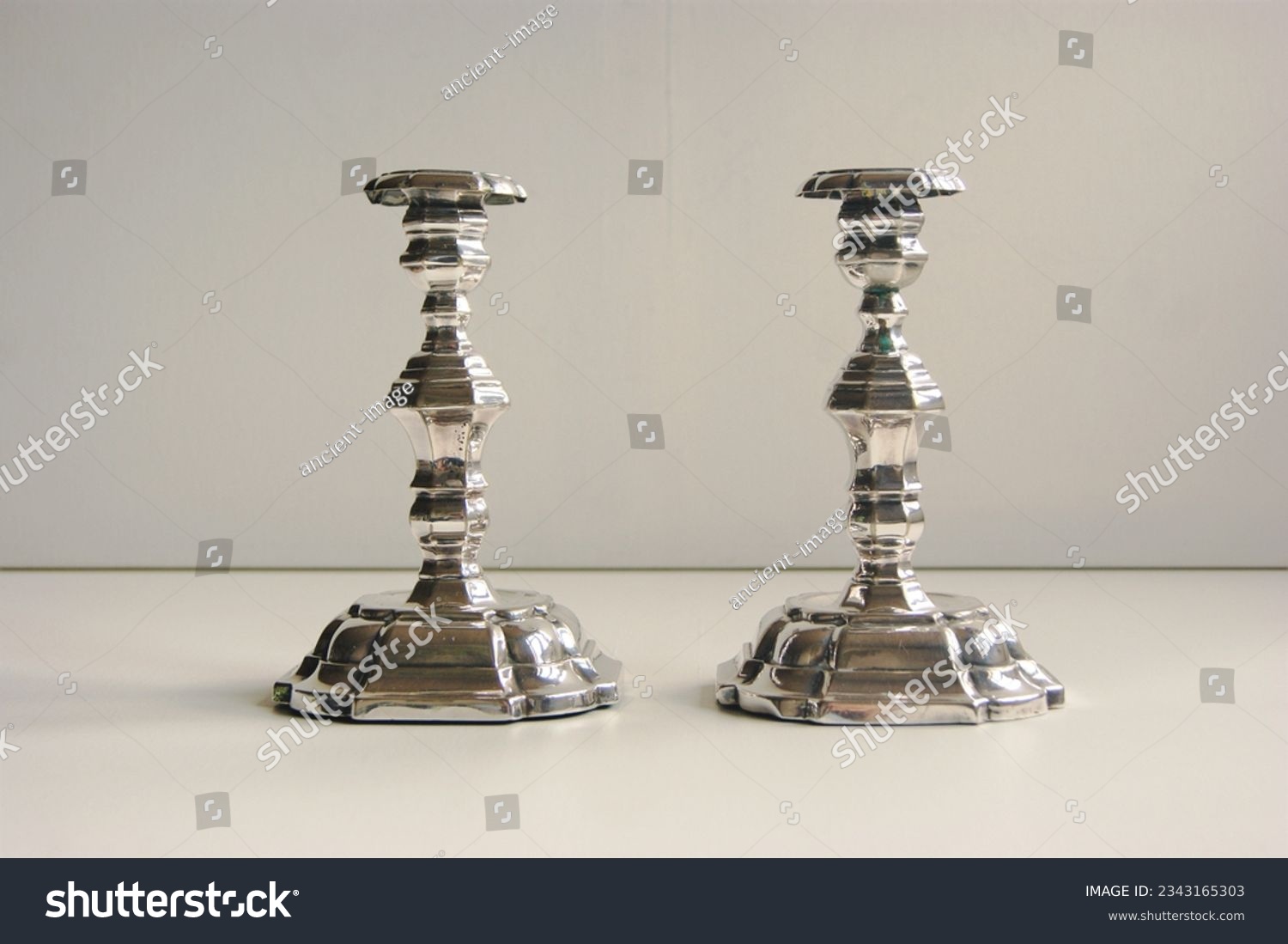 Pair of baroque silver candle holder. 18th century. #2343165303