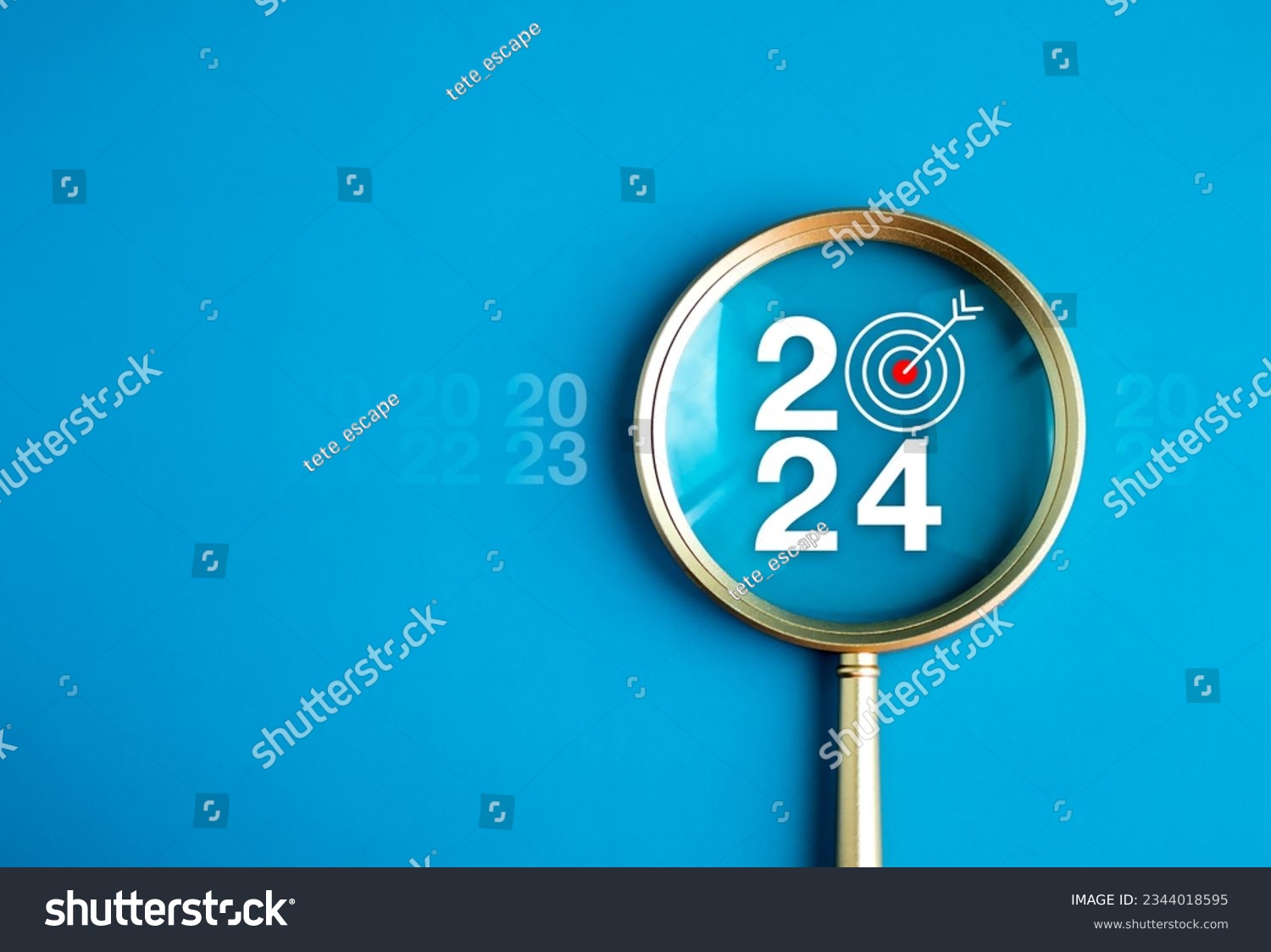 Happy new year 2024 with business concept banner. The big white 2024 year number with Target icon inside the golden magnifying glass on light blue background. Planning for goal and success concepts. #2344018595