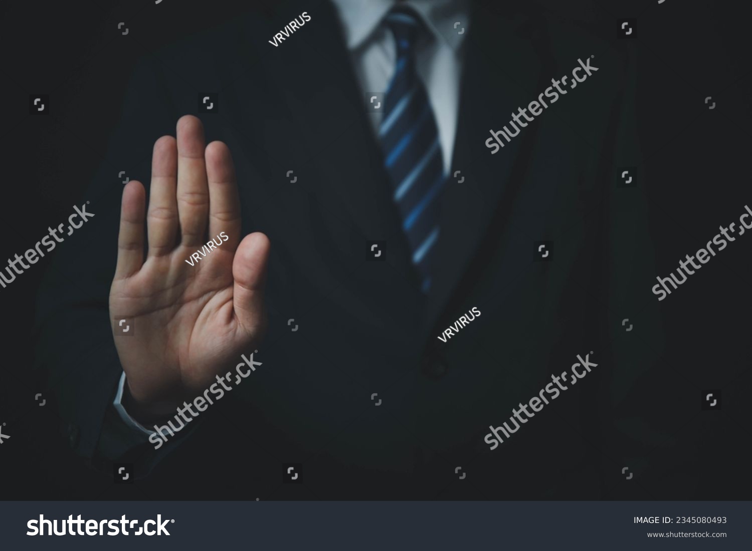 male hand showing stop gesture Concept of stop violence. Warning, prohibition, denial. On dark background. #2345080493