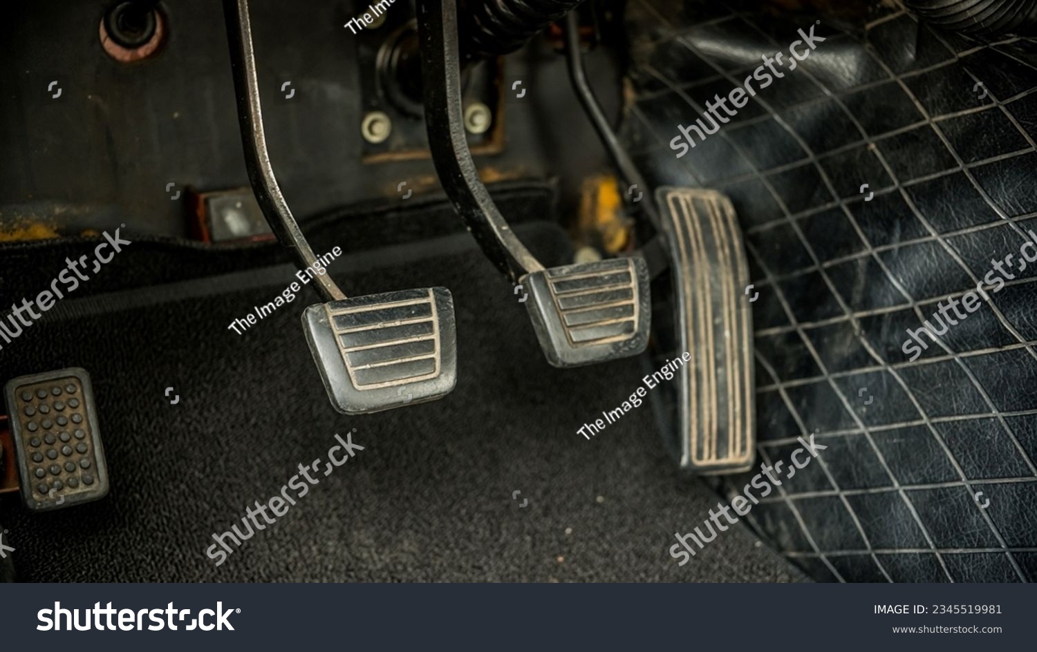 Pedals inside a vintage car #2345519981