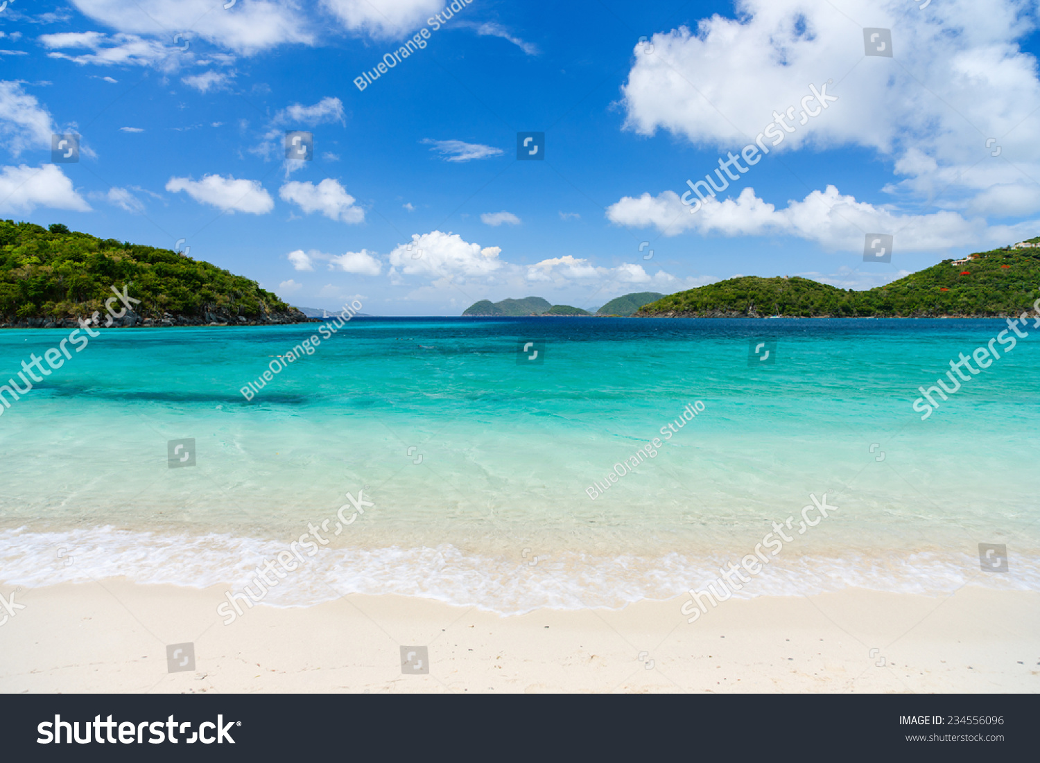 Beautiful tropical beach with white sand, turquoise ocean water and blue sky at St John, US Virgin Islands in Caribbean #234556096