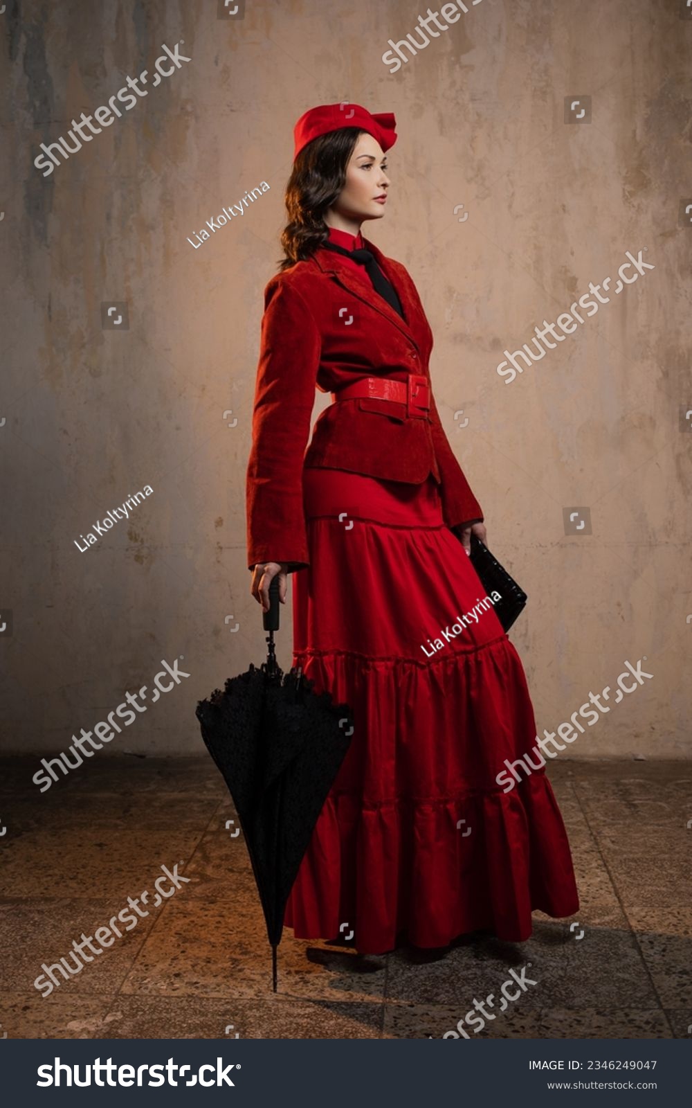 Mary Poppins. A stylish lady in a red old-fashioned suit with a hat and a lace umbrella #2346249047