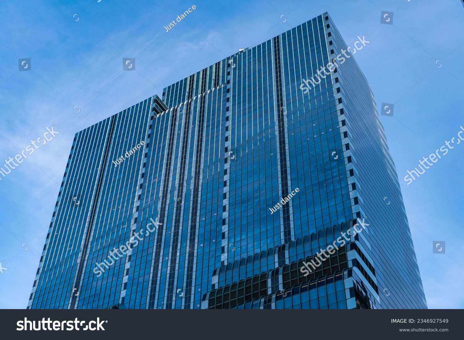 skyscraper in metropolis city. city downtown with skyscraper. office building in business district. skyscraper building architecture. skyscraper with reflective glassy facade. modern glass building #2346927549