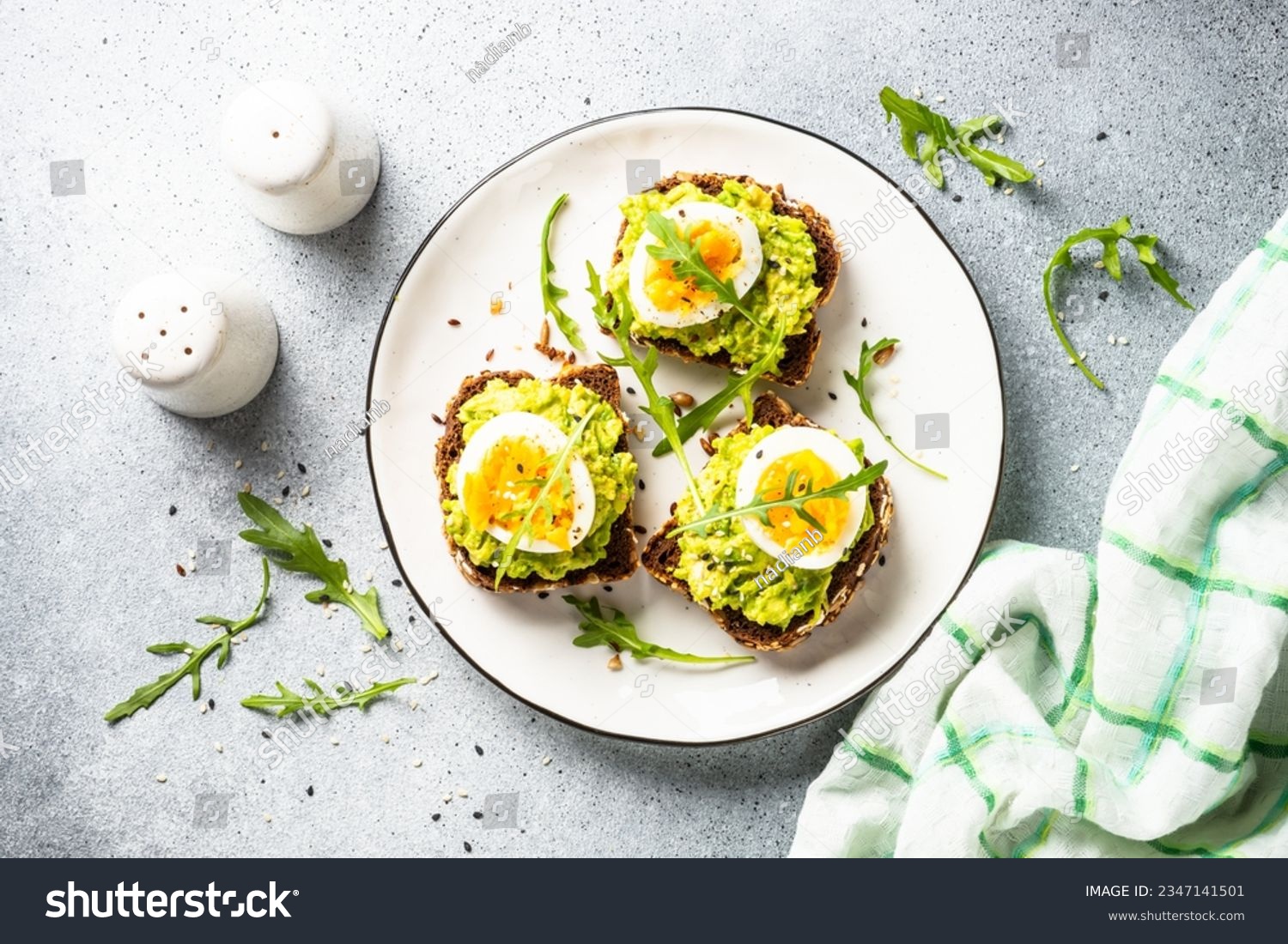 Whole grain bread with avocado and boiled eggs. #2347141501