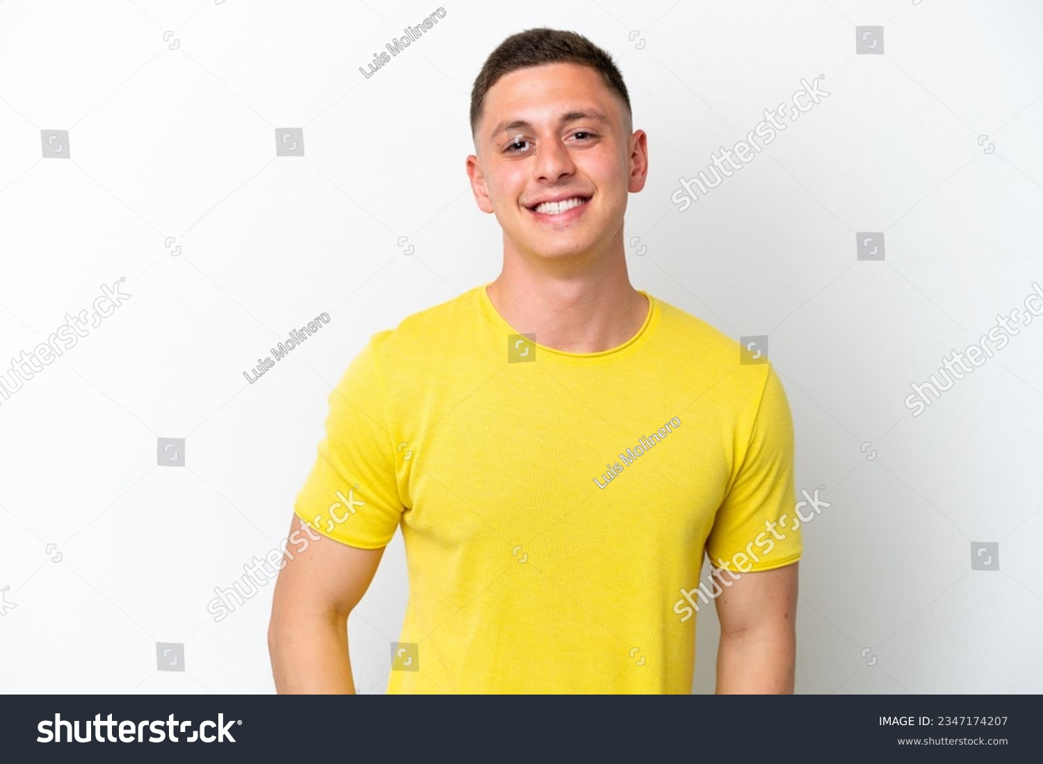 Young brazilian man isolated on white background laughing #2347174207
