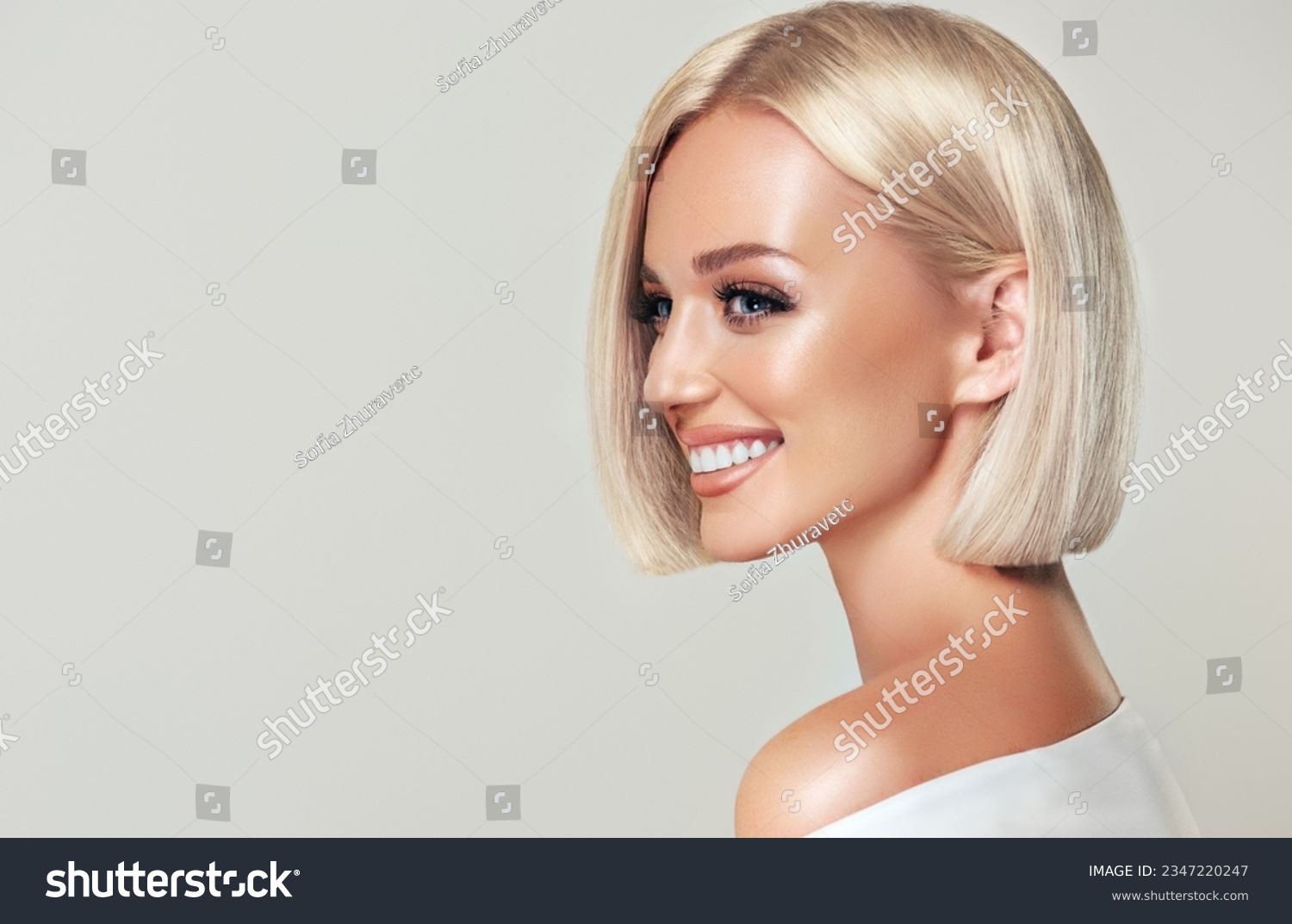 Beautiful model girl with short straight hair .Beauty woman with blonde Bob   hairstyle  .Fashion, cosmetics and makeup #2347220247