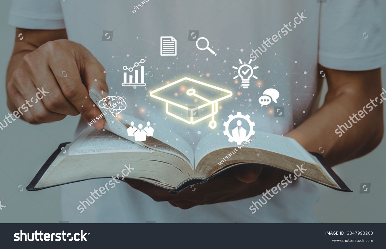 Education concept.Male student opening book with icon.Education internet Technology.knowledge,wisdom,graduate. #2347993203